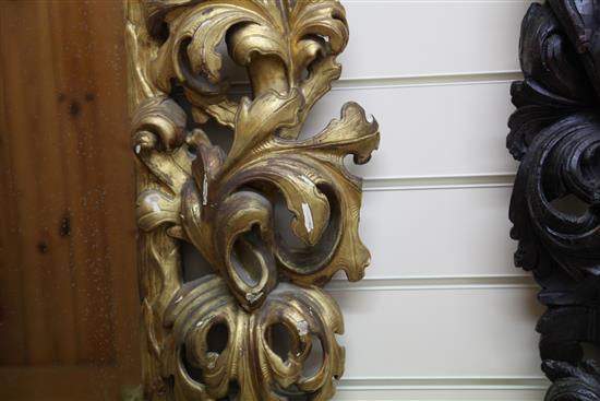 An 18th century Italian carved giltwood wall mirror, 3ft x 2ft 8in.
